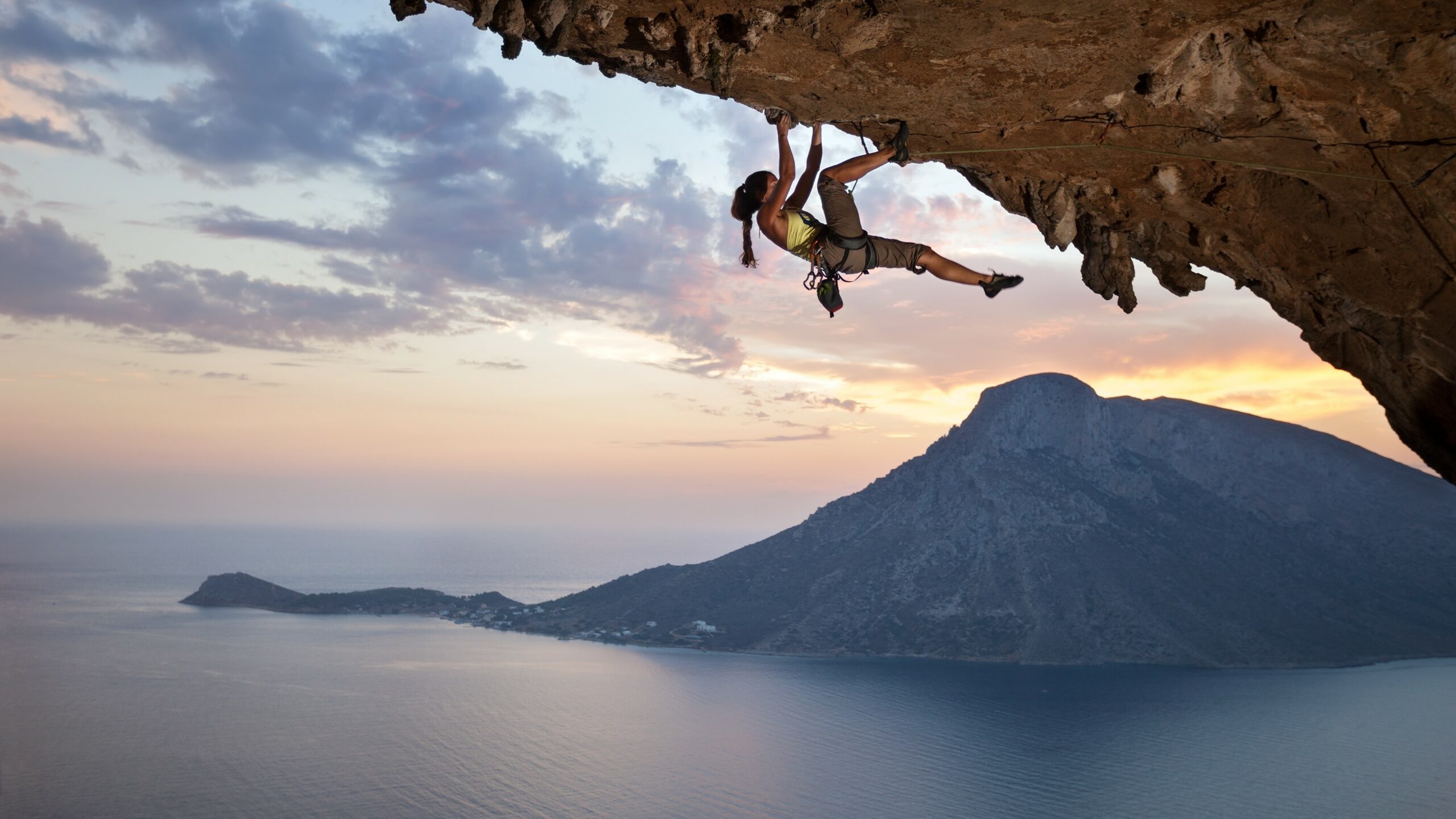 woman climbing mountain