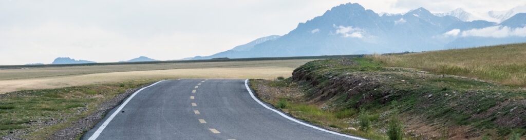 Road curve toward mountains