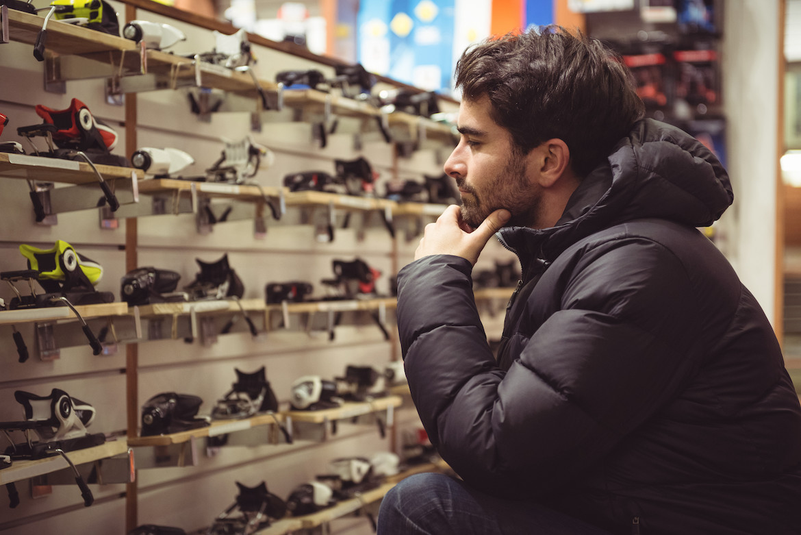 man shopping in a shoe department