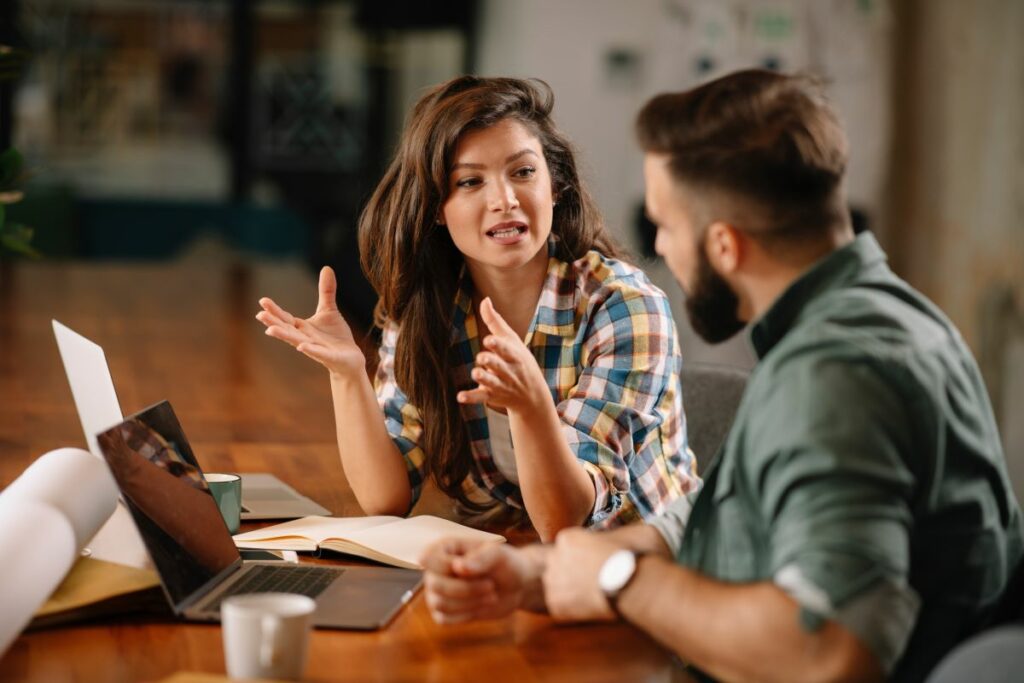 compliance team members meeting in an office setting