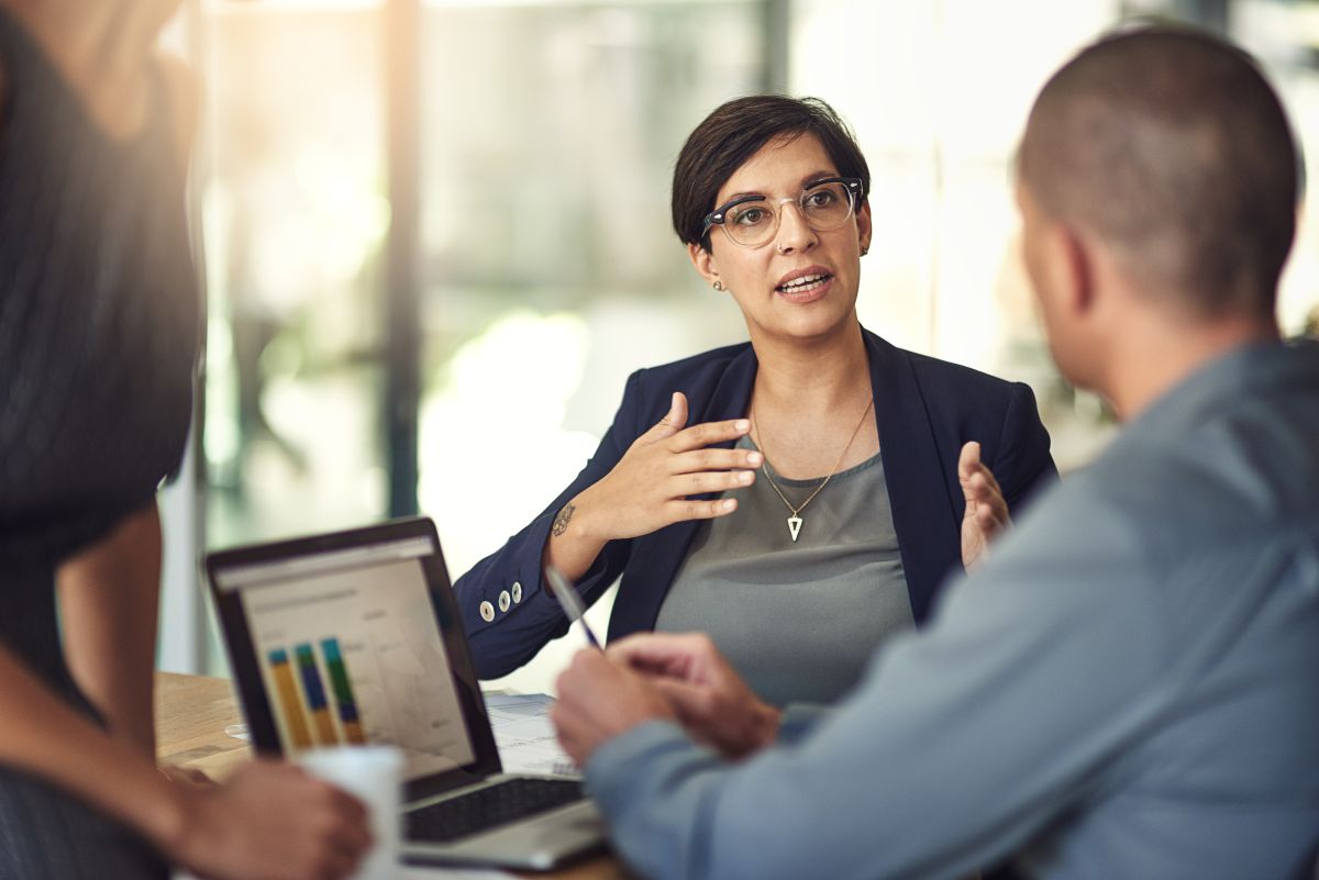 female sales rep in meeting with client