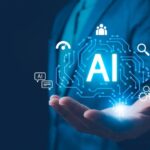 Business professional holding a holographic AI icon with technology and security symbols.