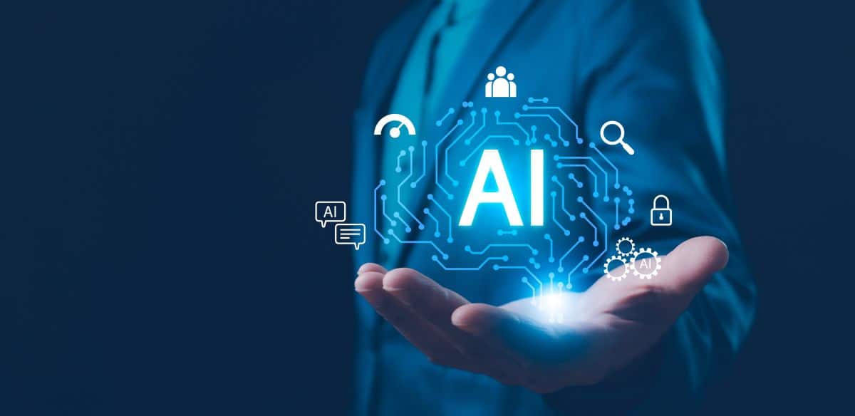Business professional holding a holographic AI icon with technology and security symbols.
