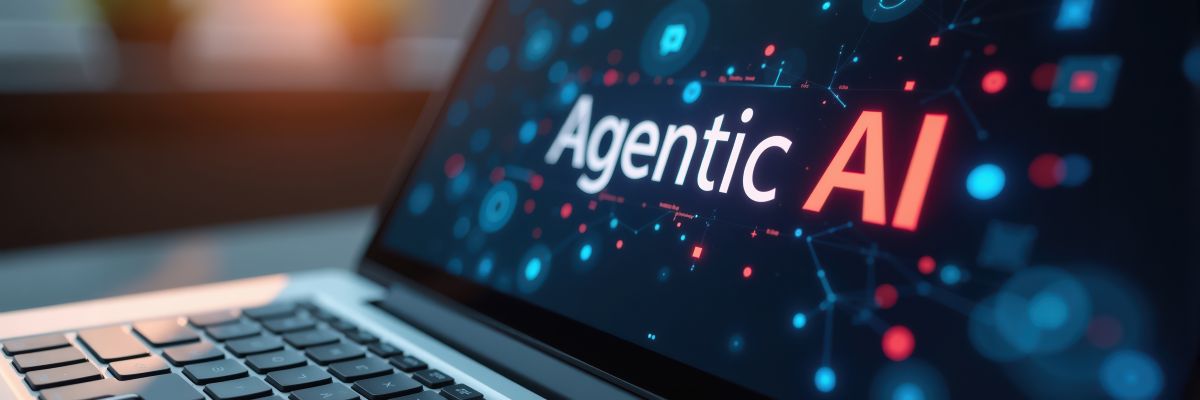 laptop computer screen displaying the text "Agentic AI"
