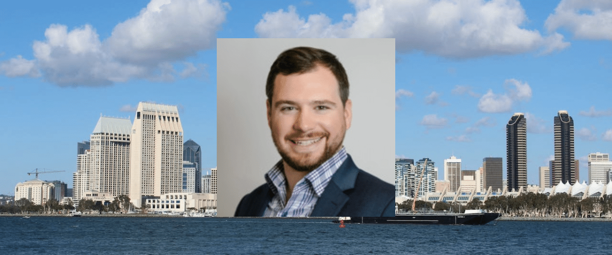 photo of Tim Frerichs against a background showing the San Diego skyline
