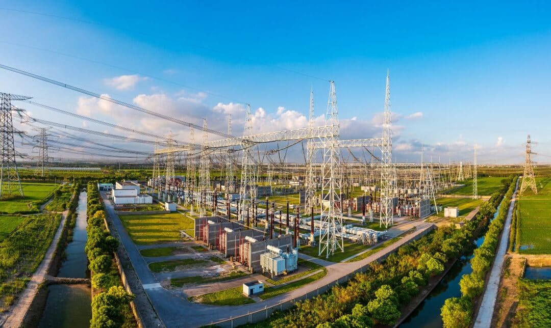 aerial shot of a large power plant and surrounding infrastructure