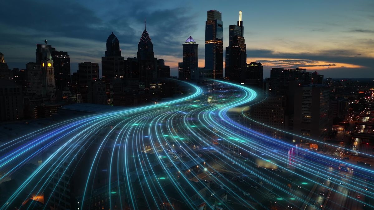 Band lights over modern urban cityscape at night