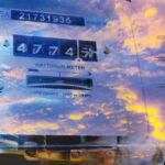 Business professional holding a holographic AI icon with technology and security symbols.