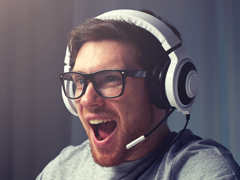 happy man playing video game